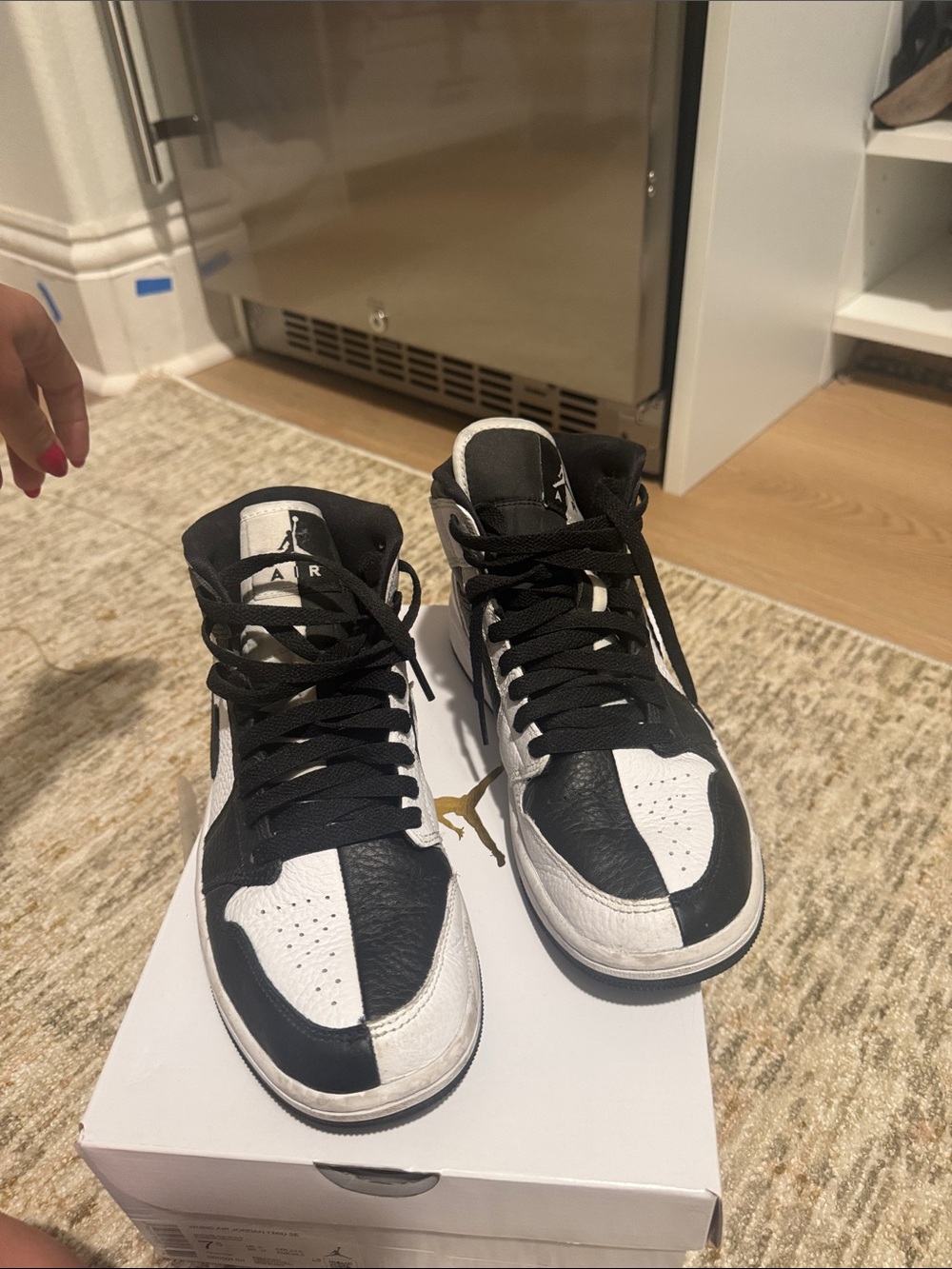 Nike Black and White High-Top Sneakers with Lace-Up Closure